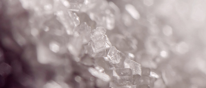 Synthetic white crystals resembling drugs – chemical substances, forensic science, and illegal drug production concept